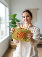 Load image into Gallery viewer, Woman holding crochet pouch with makeup brushes
