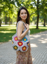 Load image into Gallery viewer, Woman Holding Granny Squares Crochet Bag
