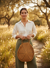 Load image into Gallery viewer, Woman holding hexagon mustard bag
