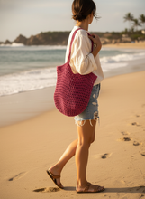 Load image into Gallery viewer, Woman Holding Pink &amp; Black Bag
