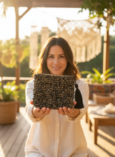 Load image into Gallery viewer, Woman holding Raffia Crochet Pouch
