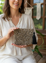 Load image into Gallery viewer, Woman holding Raffia Crochet Pouch

