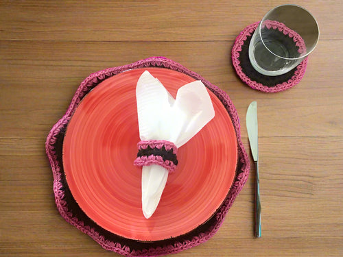 brown and pink crochet placemat, napkin ring and coaster